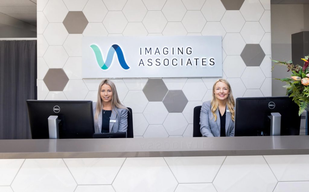 Friendly receptionists at Imaging Associates Radiology Drouin.